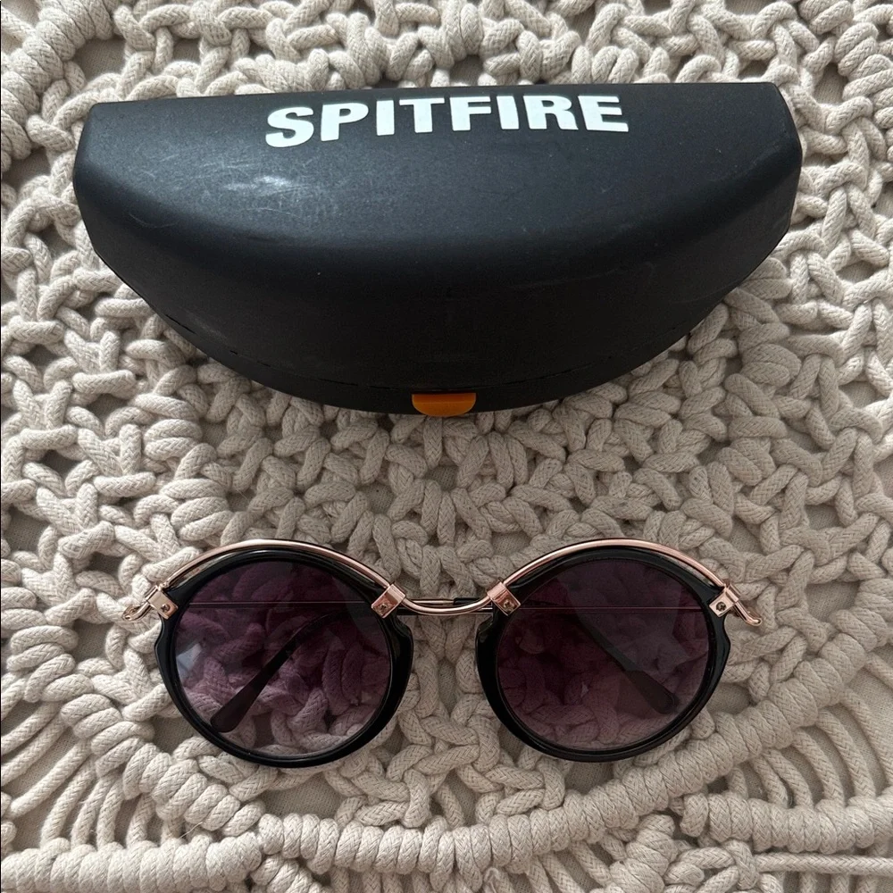 Spitfire Round Sunglasses Black Frames with Rose Gold Accents and Purple Lenses